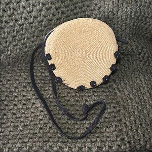 Round Straw Crossbody Bag with Black Accents